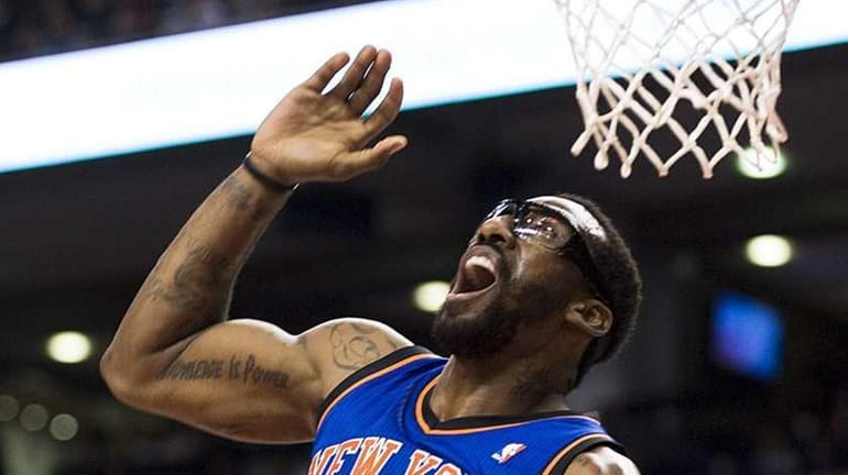 Amar'e Stoudemire reacts after fumbling a drive to the net...