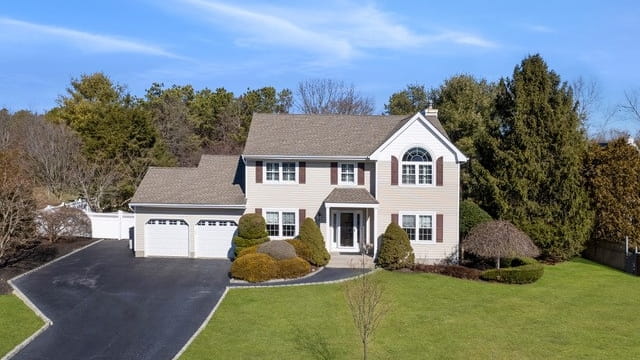 This four-bedroom home on a cul-de-sac in Manorville sold for...