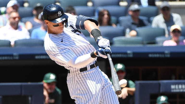 New York Yankees' Aaron Judge hits a two-run home run...