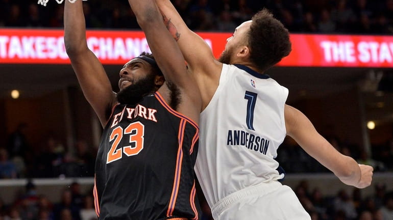 Grizzlies forward Kyle Anderson blocks a shot by Knicks center Mitchell...