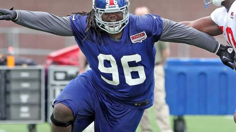 Giants defensive tackle Marvin Austin practices rushing the passer at...