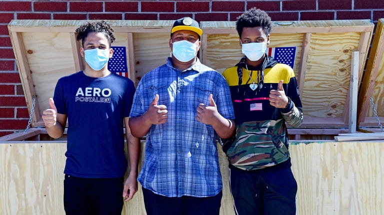 In Oakdale, carpentry students in David Rosman's class at the...