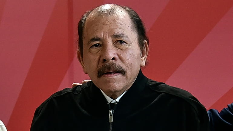 Nicaragua's President Daniel Ortega poses for a photo during the...