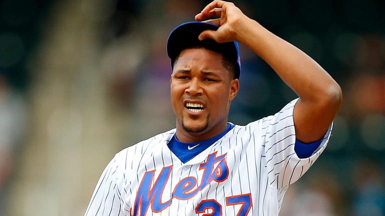 Jeurys Familia of the New York Mets stands on the...