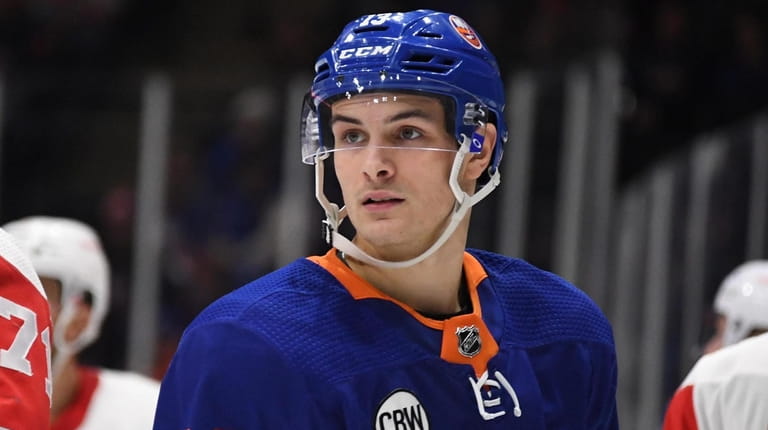 Islanders center Mathew Barzal looks on against the Red Wings...