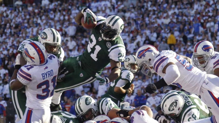 New York Jets' LaDainian Tomlinson scores a touchdown against the...