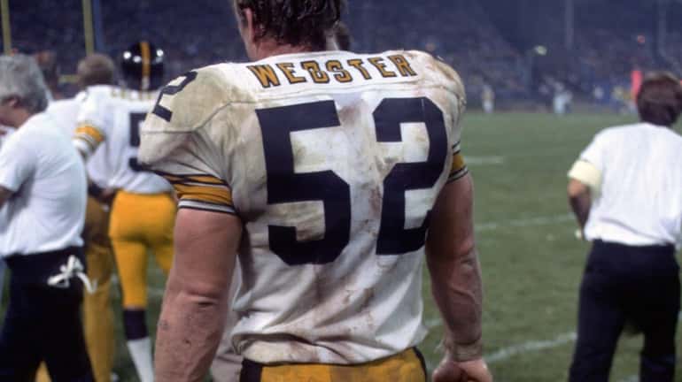 Offensive lineman Mike Webster #52 of the Pittsburgh Steelers on...