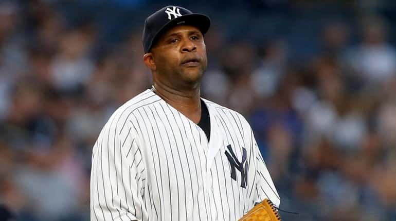 Yankees pitcher CC Sabathia stands on the mound during the second...