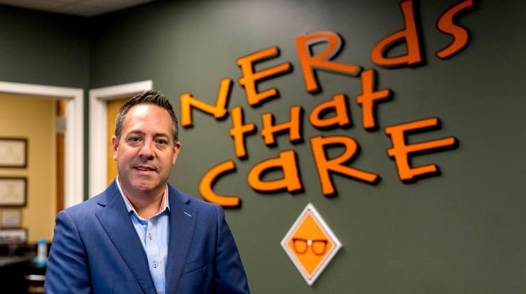 James Rocker, CEO of Nerds That Care, in his office...