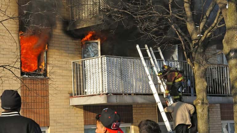 Two people are rescued from a balcony at a Hempstead...