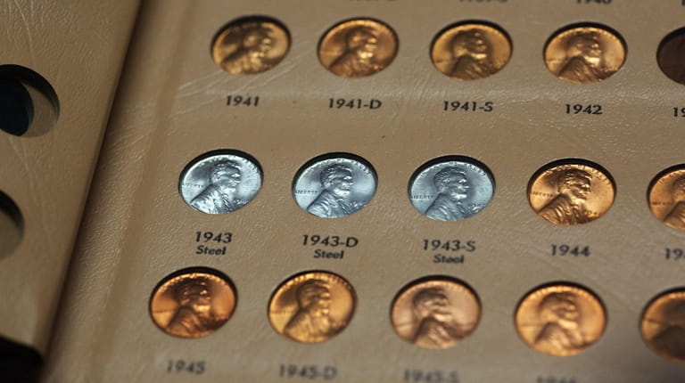 Dr. David Menchell's penny collection is sorted by date and mint. 