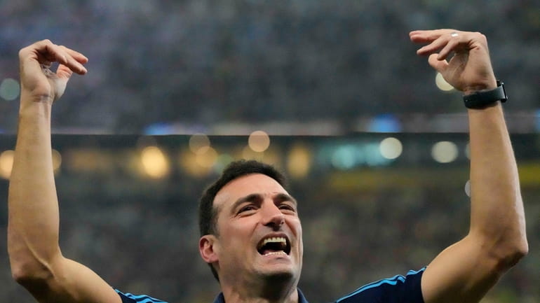 FILE - Argentina's head coach Lionel Scaloni celebrates his team's...