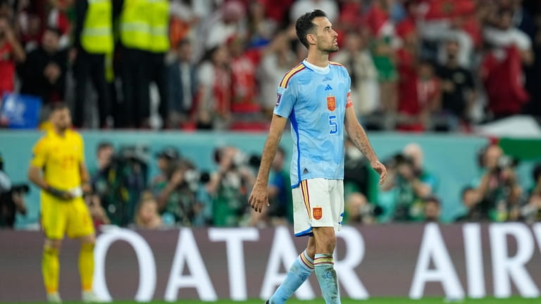 Spain's Sergio Busquets reacts after missing a penalty in a...