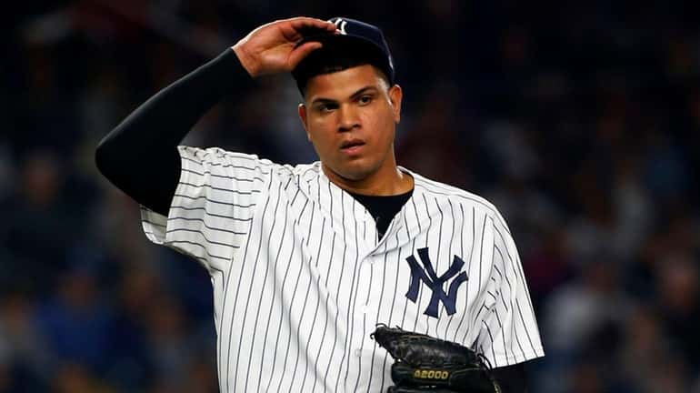 Yankees pitcher Dellin Betances reacts on the mound during the...