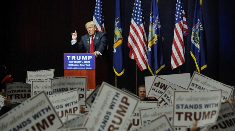 Donald Trump rallies his supporters on Long Island at Grumman...