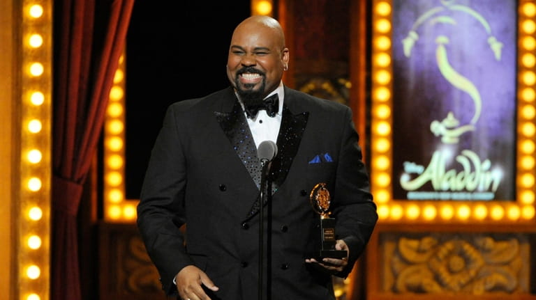 James Monroe Iglehart accepts the award for best performance by...
