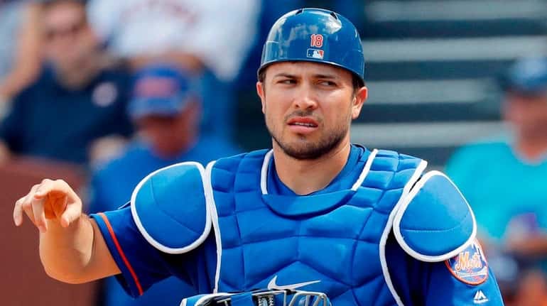 Mets catcher Travis d'Arnaud has a partially torn ligament in...