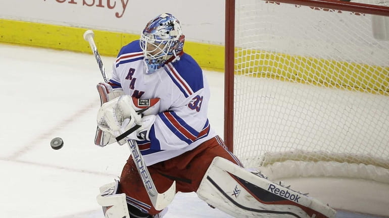 Cam Talbot (33) stops a shot on goal during the...