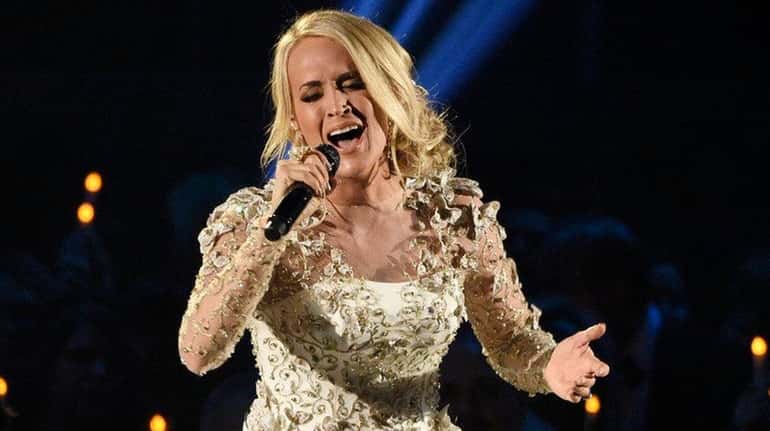 Carrie Underwood performs during the 51st annual CMA Awards at...