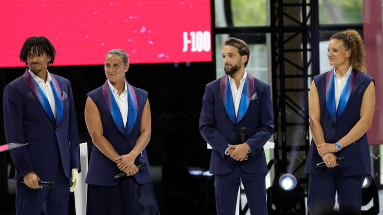 From left, French athletes Arnaud Assoumani, Pauline Deroulede, Romain Cannone,...