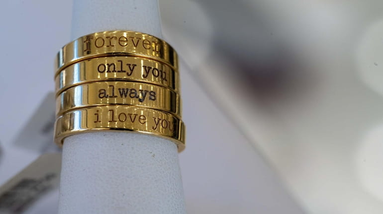 Various promise rings with the words "forever," "only you," "always"...