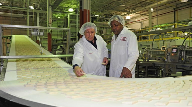 From left, Richard R. Wenner, co-owner of Wenner Bread Products...