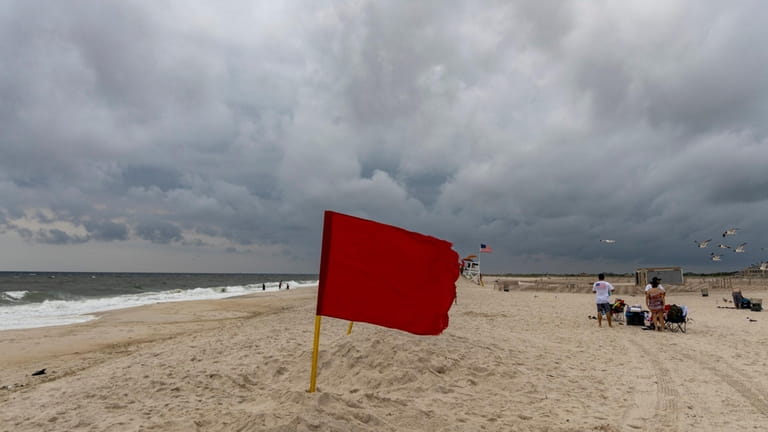 A red flag at Jones Beach alerts swimmers to sharks...