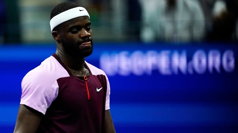 Frances Tiafoe reacts after losing to Carlos Alcaraz in the semifinals...