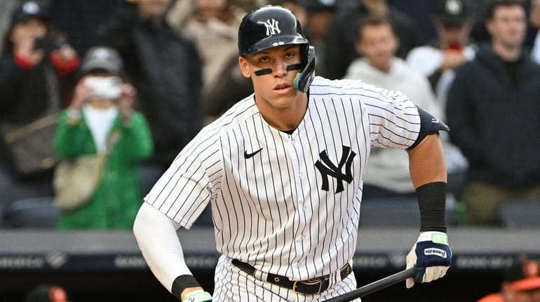 The Yankees' Aaron Judge draws a walk against the Orioles...