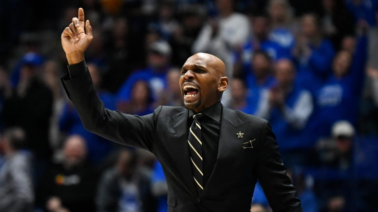 Vanderbilt coach Jerry Stackhouse shouts to players during the first...