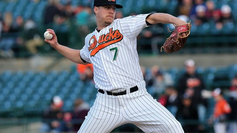 Long Island Ducks starting pitcher John Brownell delivers a pitch...