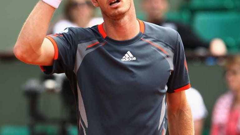 Andy Murray of Great Britain celebrates a point during his...
