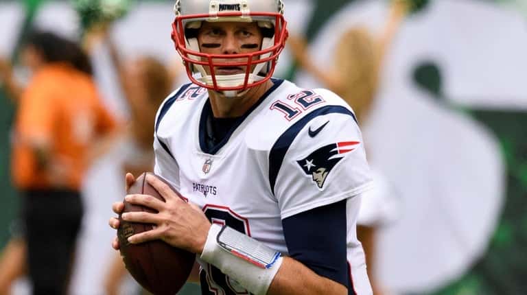 New England Patriots quarterback Tom Brady (12) during the first...