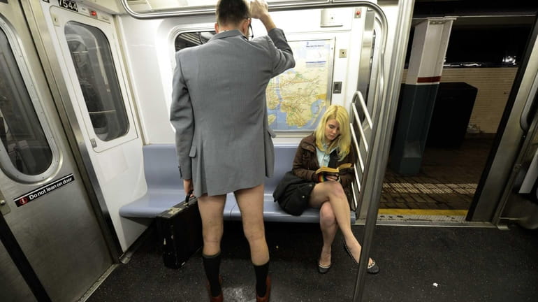 Participants en route in Improv Everywhere's annual No Pants Subway...