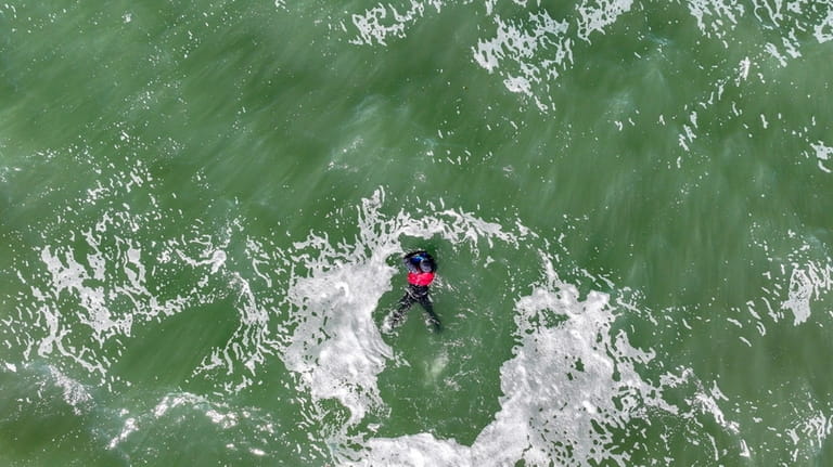Photo taken by Mike Busch of the capsized kayaker.