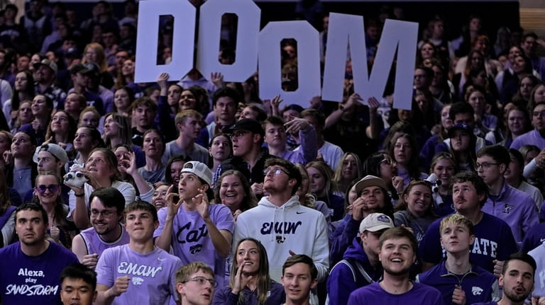 Kansas State fans cheer during the second half of a...