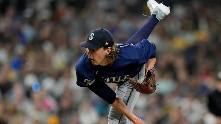Seattle Mariners starting pitcher Logan Gilbert works against a San...