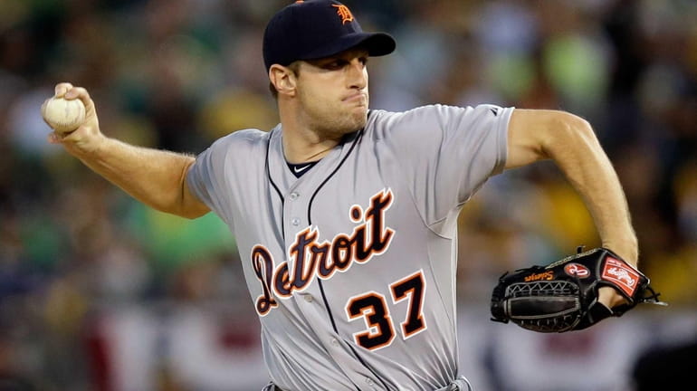 Max Scherzer of the Detroit Tigers throws a pitch in...