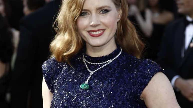 Actress Amy Adams arrives at the 83rd annual Academy Awards...