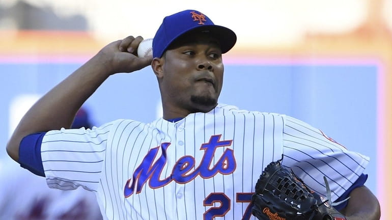 Mets relief pitcher Jeurys Familia delivers a pitch against the...