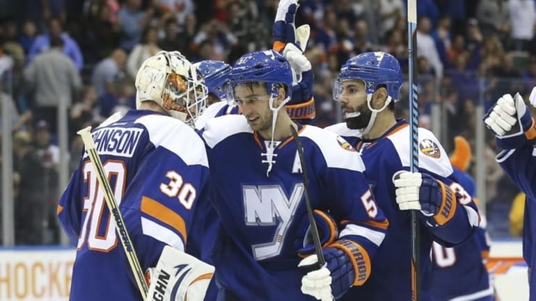 New York Islanders center Frans Nielsen (51) celebrates with goalie...