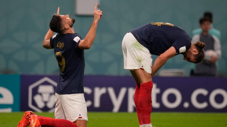 France's Olivier Giroud celebrate after he scored during the World...