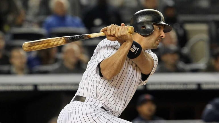 Jorge Posada singles in the second inning against during the...