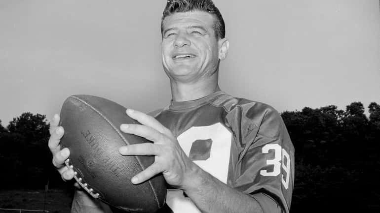 FILE - York Giants Halfback Hugh McElhenny, poses at the...