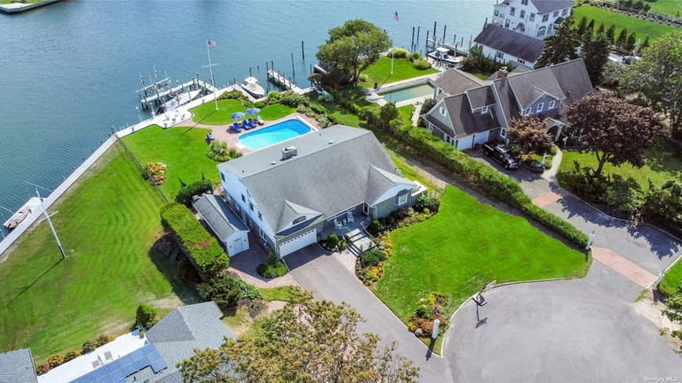 Priced at $1.299 million, this split-level on Bayside Avenue has...