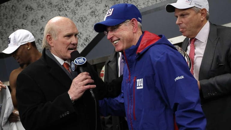 Head coach Tom Coughlin is interviewed by Terry Bradshaw after...
