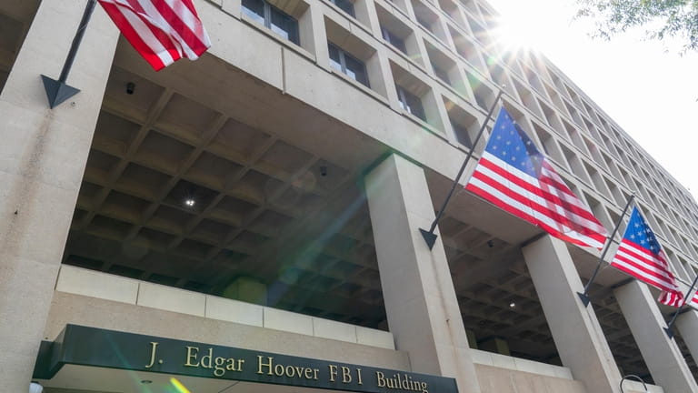 The J. Edgar Hoover FBI Building is seen Friday, June...