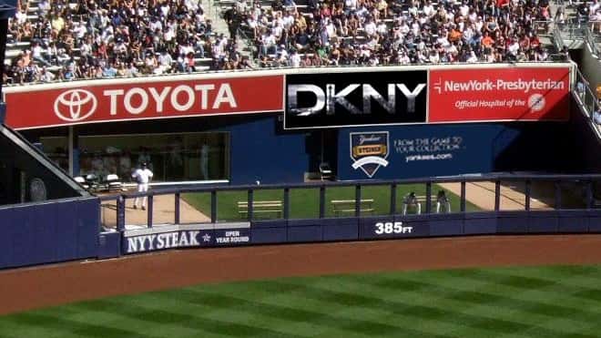 DKNY has a new presence in the outfield of Yankee...