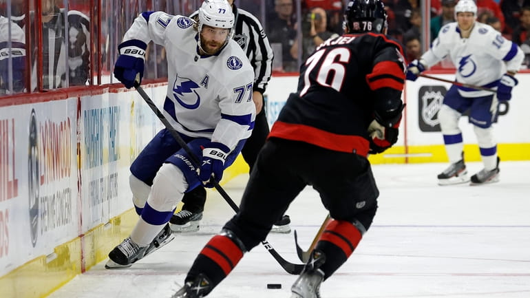 Tampa Bay Lightning's Victor Hedman (77) controls the puck in...