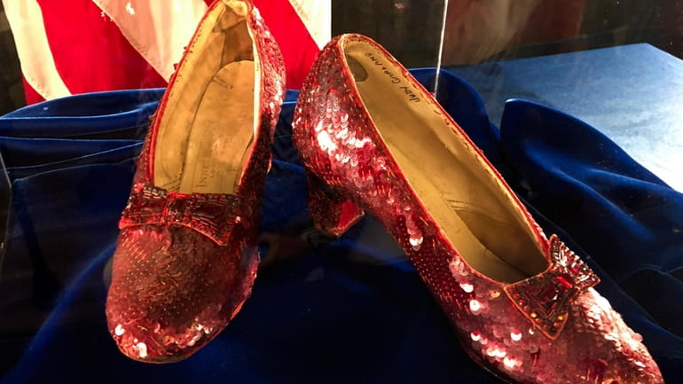 Ruby slippers once worn by Judy Garland in the "The...